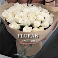 Bouquet of white roses in craft paper - Photo 1