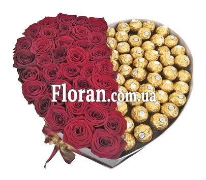Квіти з цукерками у великій коробці