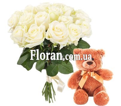 Teddy bear with white roses