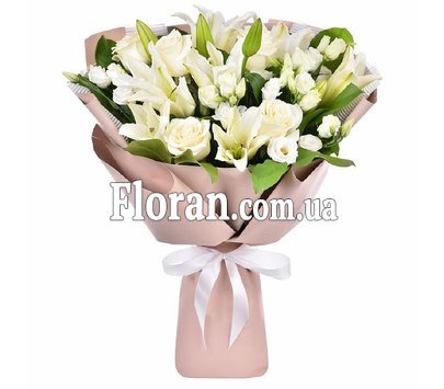 White flowers in a bouquet with roses