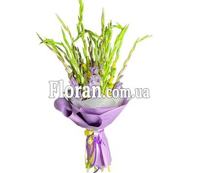 Гарно упакований букет гладіолусів