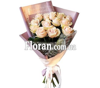Bouquet of cream roses in fashionable packaging