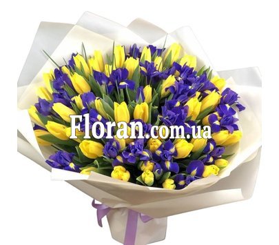 Bouquet of yellow tulips and blue irises